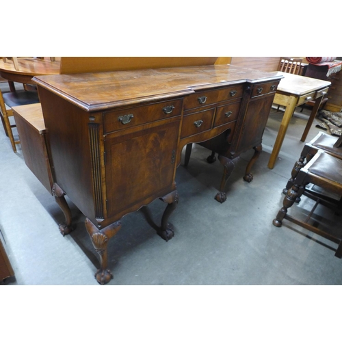 230 - A Queen Anne style mahogany breakfront sideboard