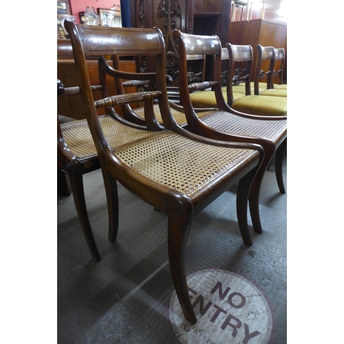 241 - A set of four Regency mahogany and bergere seated dining chairs