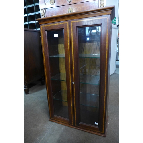 242 - An inlaid mahogany wall mounted display cabinet