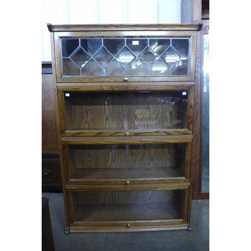 243 - An oak four tier bookcase