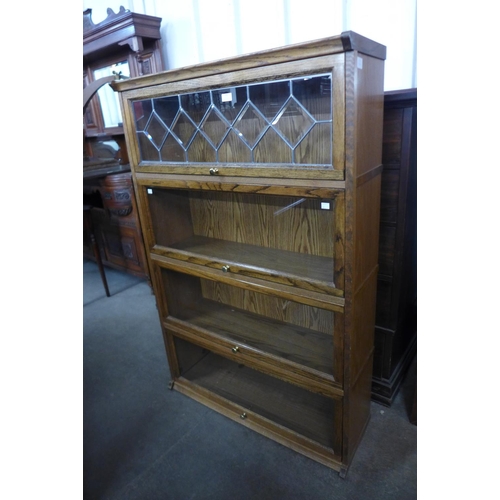 243 - An oak four tier bookcase