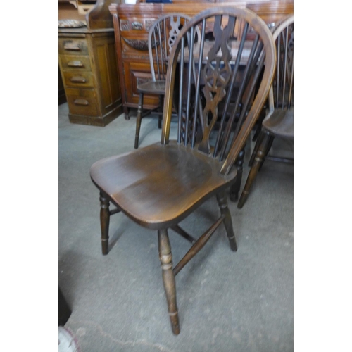 248 - An oak barleytwist gateleg table and four chairs