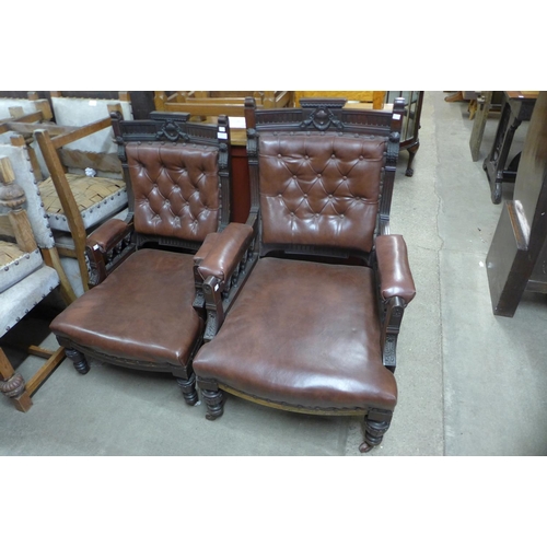 264 - A pair of Victorian carved mahogany and leather upholstered lady's and gentleman's armchairs