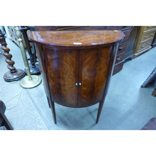 265 - An inlaid mahogany demi-lune side cabinet