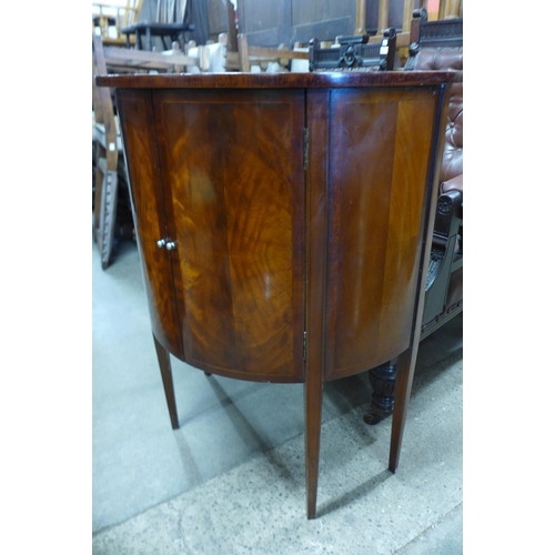 265 - An inlaid mahogany demi-lune side cabinet