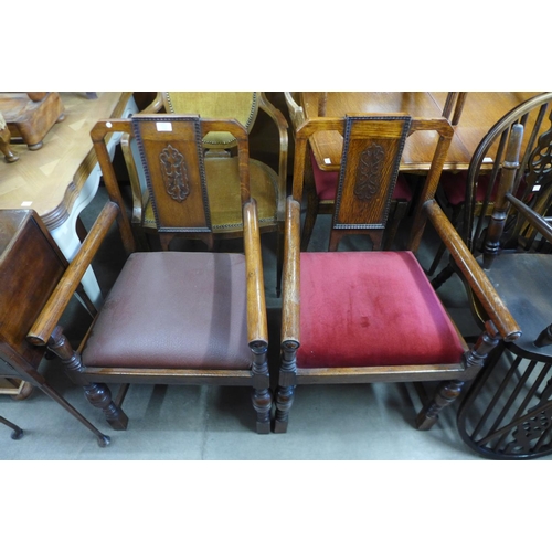 278a - A pair of carved oak open armchairs