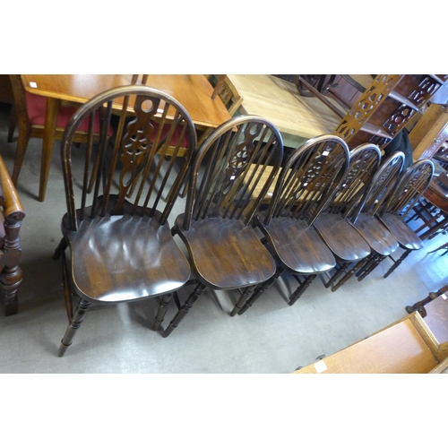 280 - A set of six beech wheelback chairs