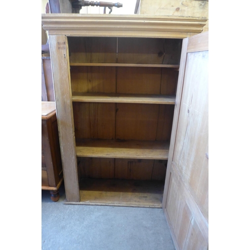 303 - A Victorian pine single door cupboard