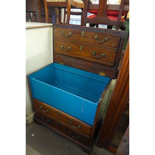 385 - A George III mahogany cabinet (converted from a commode)