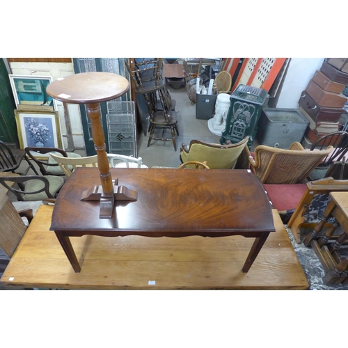 388 - A mahogany coffee table and an oak wine table