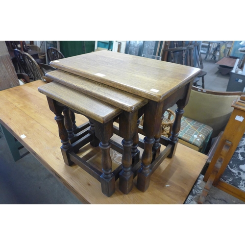 390 - An oak nest of tables