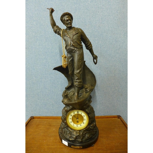 41 - A large 19th Century spelter figural  mantel clock, titled  Cod Fishing, 75cms h