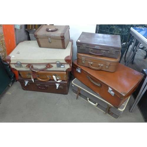 450 - Eight vintage suitcases