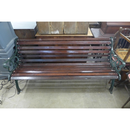 467 - A cast iron ended garden bench