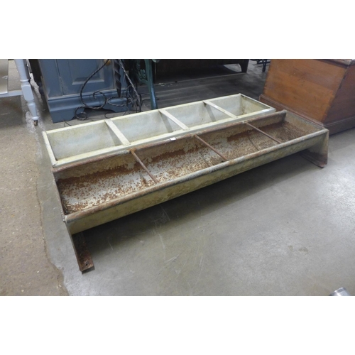 469 - Two galvanised troughs