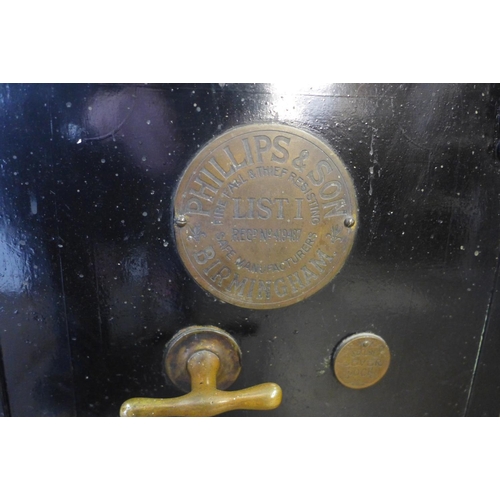 599w - An early 20th Century Phillips and Sons, Birmingham steel fire resistant safe (with key)