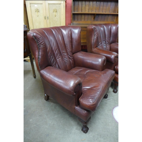 88 - A pair of Tetrad Blake mahogany and chestnut brown leather armchairs