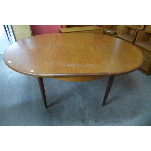 135 - A G-Plan Fresco teak extending dining table