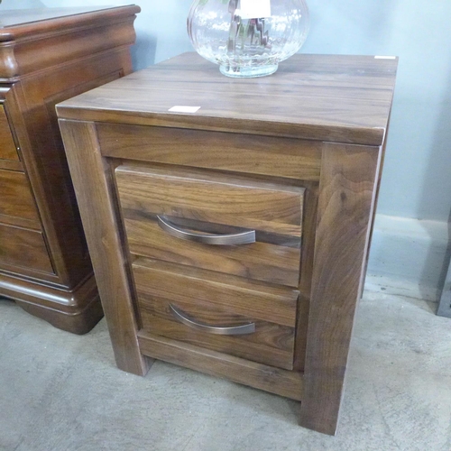 1525 - A two drawer hardwood bedside chest * This lot is subject to VAT- General marks.