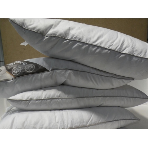 3130 - Four Hotel Grand Double Down Jumbo Pillows (219-132, 219) * This lot is subject to VAT