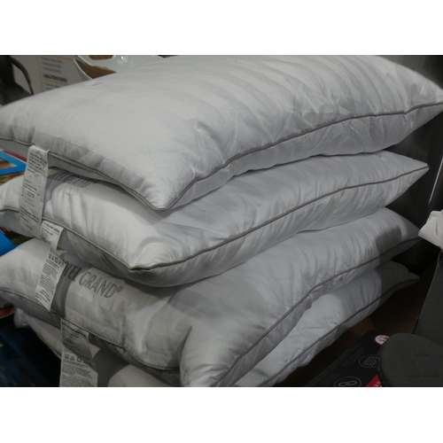 3179 - Four Hotel Grand Down Roll Jumbo Pillows (219-224, 225) * This lot is subject to VAT