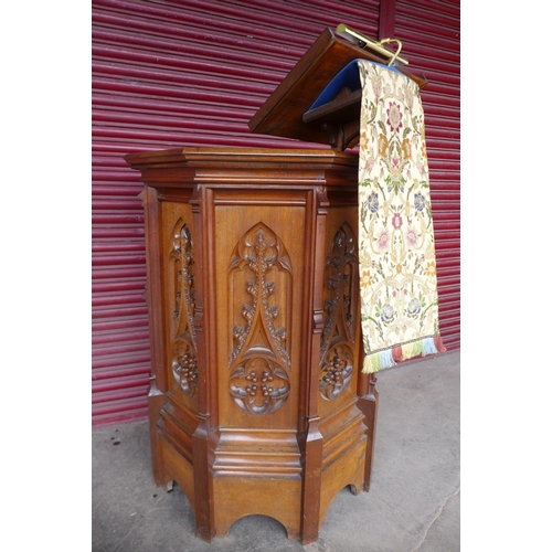 70 - A Victorian Gothic Revival carved oak church pulpit, 186cms h, 116cms w.