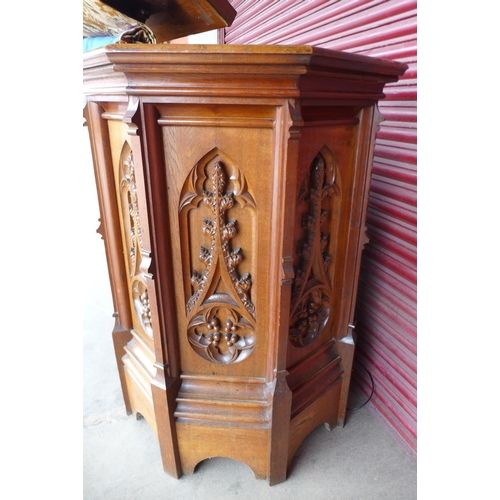 70 - A Victorian Gothic Revival carved oak church pulpit, 186cms h, 116cms w.