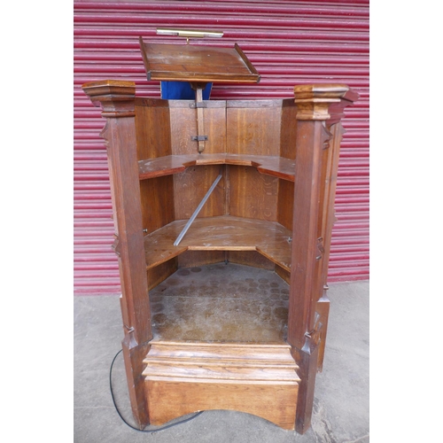 70 - A Victorian Gothic Revival carved oak church pulpit, 186cms h, 116cms w.