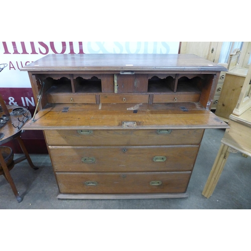 106 - A 19th Century Anglo-Indian teak military campaign secretaire chest, 105cms h, 112cms w, 45cms d