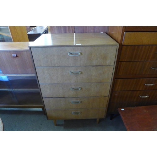 143 - A teak chest of drawers