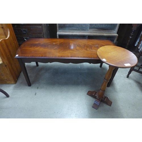 301 - A mahogany coffee table and an oak wine table