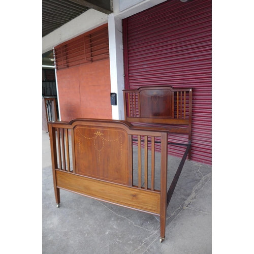 324 - A Edward VII inlaid mahogany double bed