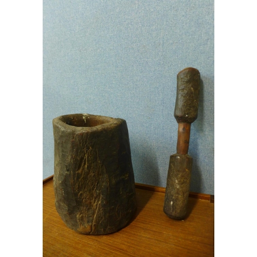 378 - A carved hardwood pestle and mortar, possibly Native American, 56cm