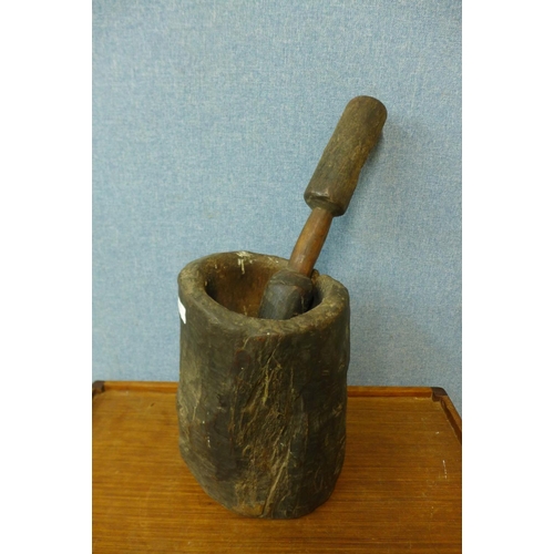 378 - A carved hardwood pestle and mortar, possibly Native American, 56cm