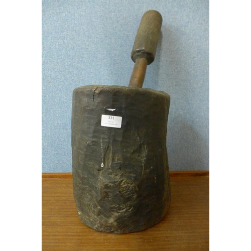 378 - A carved hardwood pestle and mortar, possibly Native American, 56cm