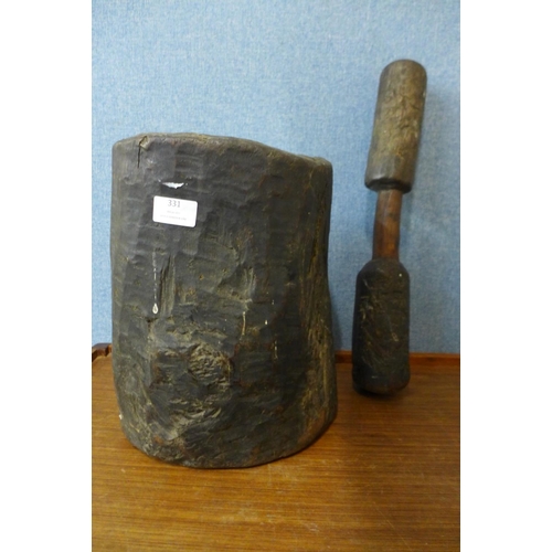 378 - A carved hardwood pestle and mortar, possibly Native American, 56cm