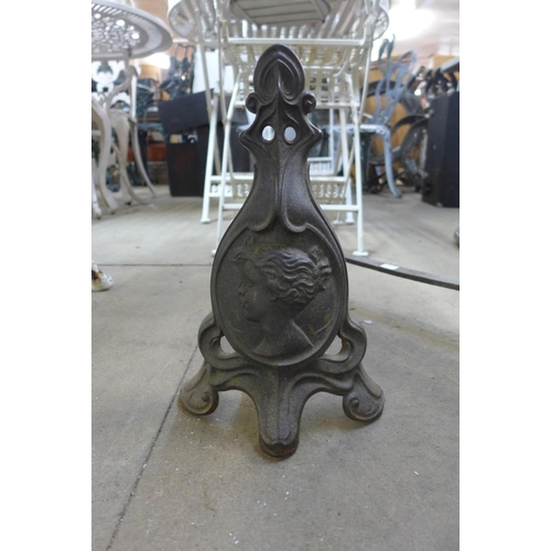 377 - A pair of French Art Nouveau cast iron andirons