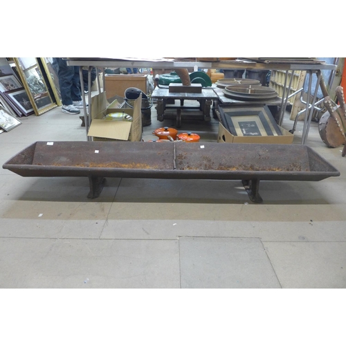 405 - A large cast iron feeding trough, 177 x 38cm