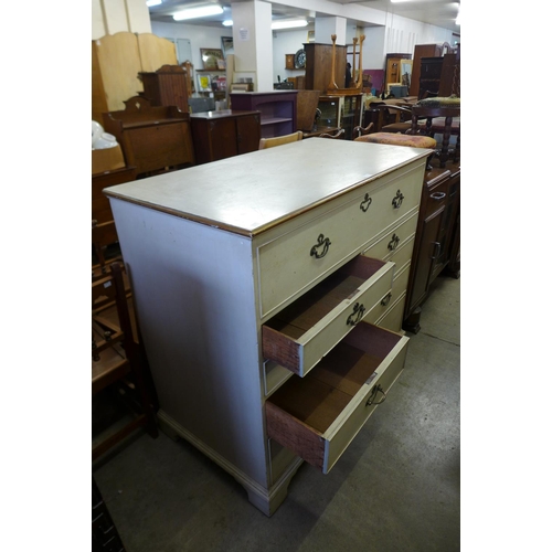 304 - A George III painted oak chest of drawers (top adapted to lift up)