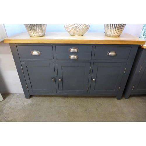 1402 - A Hampshire blue painted oak three door sideboard (KEL P58) * this lot is subject to VAT