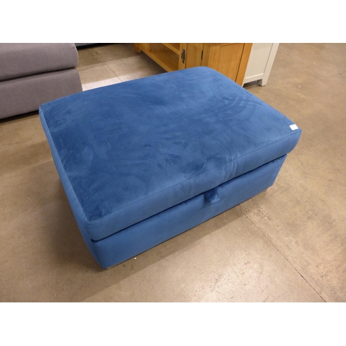 1509 - A blue upholstered ottoman footstool