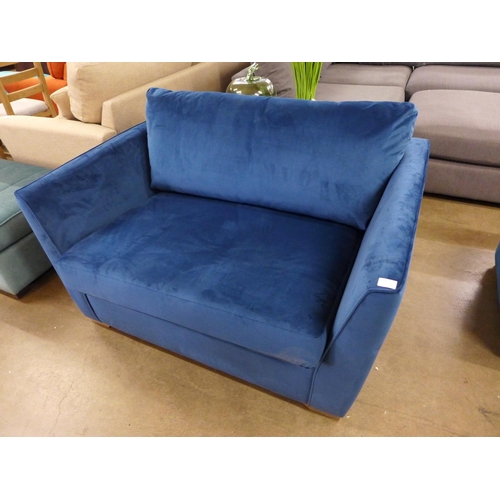 1510 - A blue upholstered chair/pull out bed