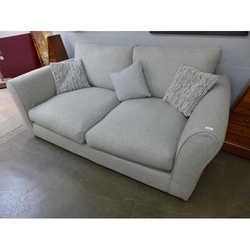 1548 - A grey upholstered three seater sofa