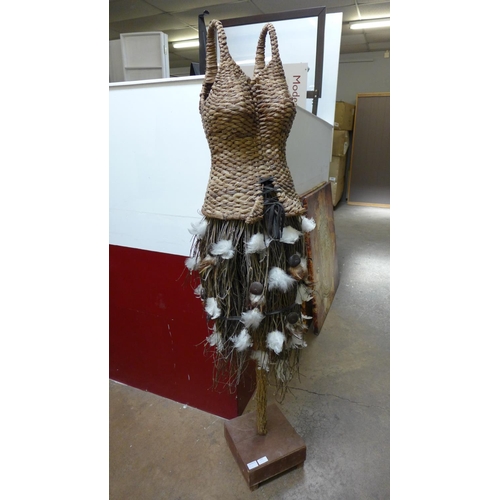 1553 - A wicker bodice, made from natural materials.