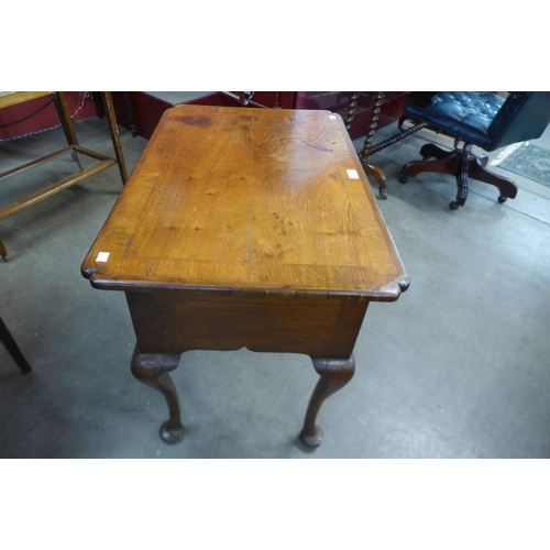 100 - A George I walnut lowboy