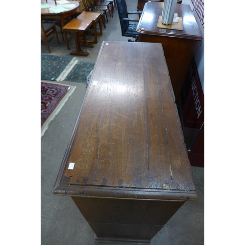 106 - A 19th Century Anglo-Indian teak military campaign secretaire chest, 105cms h, 112cms w, 45cms d