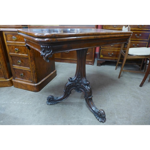 113 - An early Victorian rosewood D-shaped fold over tea table