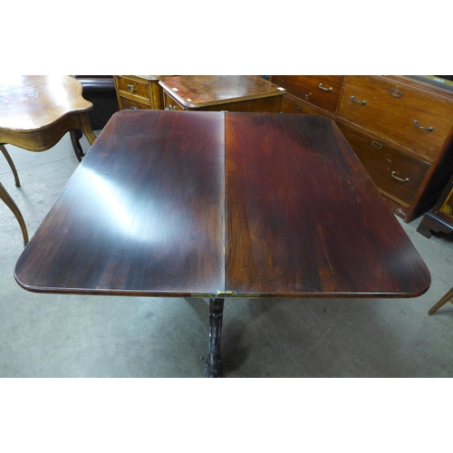 113 - An early Victorian rosewood D-shaped fold over tea table