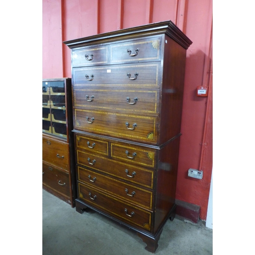 116 - A George III style inlaid mahogany chest on chest