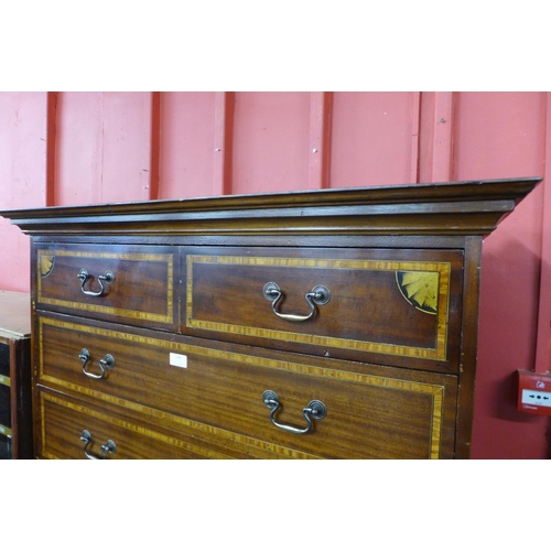 116 - A George III style inlaid mahogany chest on chest